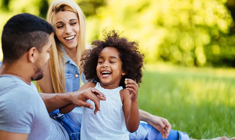family enjoying a picnic